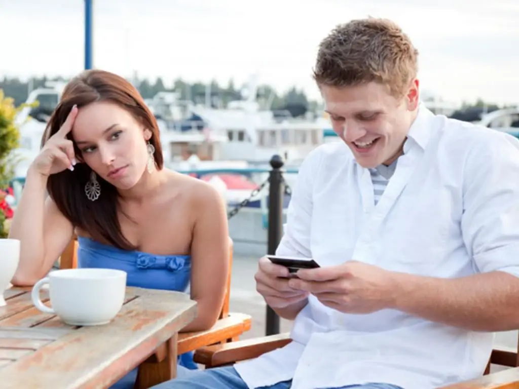 Married couple in a cafe at a table