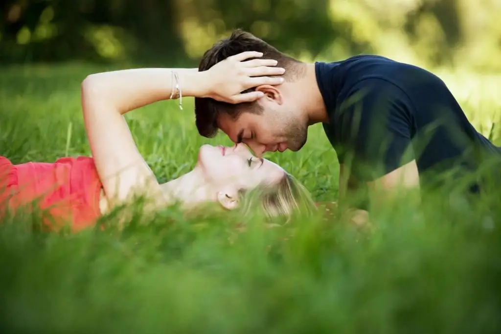 The couple is resting in nature