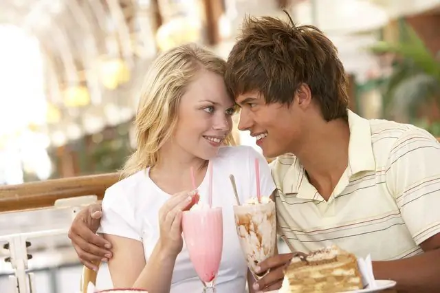 Boy and girl in a cafe