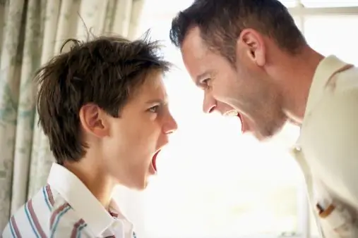 boy and man screaming at each other