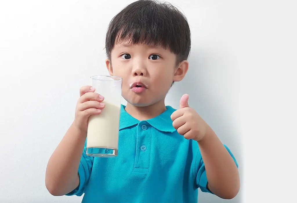 Child drinking milk drink