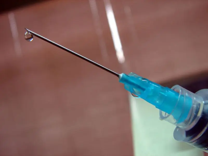 Syringe with a drop at the end