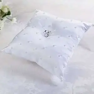 Pillows for wedding rings. Pillow for rings in the shape of a heart