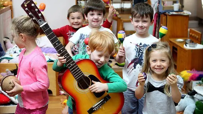 children perform music