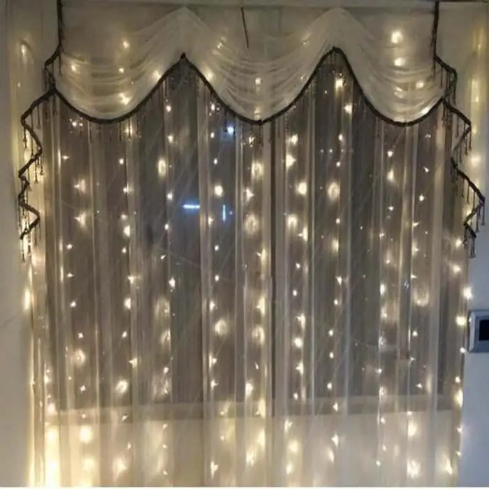 DIY garland ntawm lub qhov rais